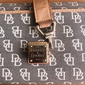 Dooney & Bourke 1975 trifold clutch wallet.